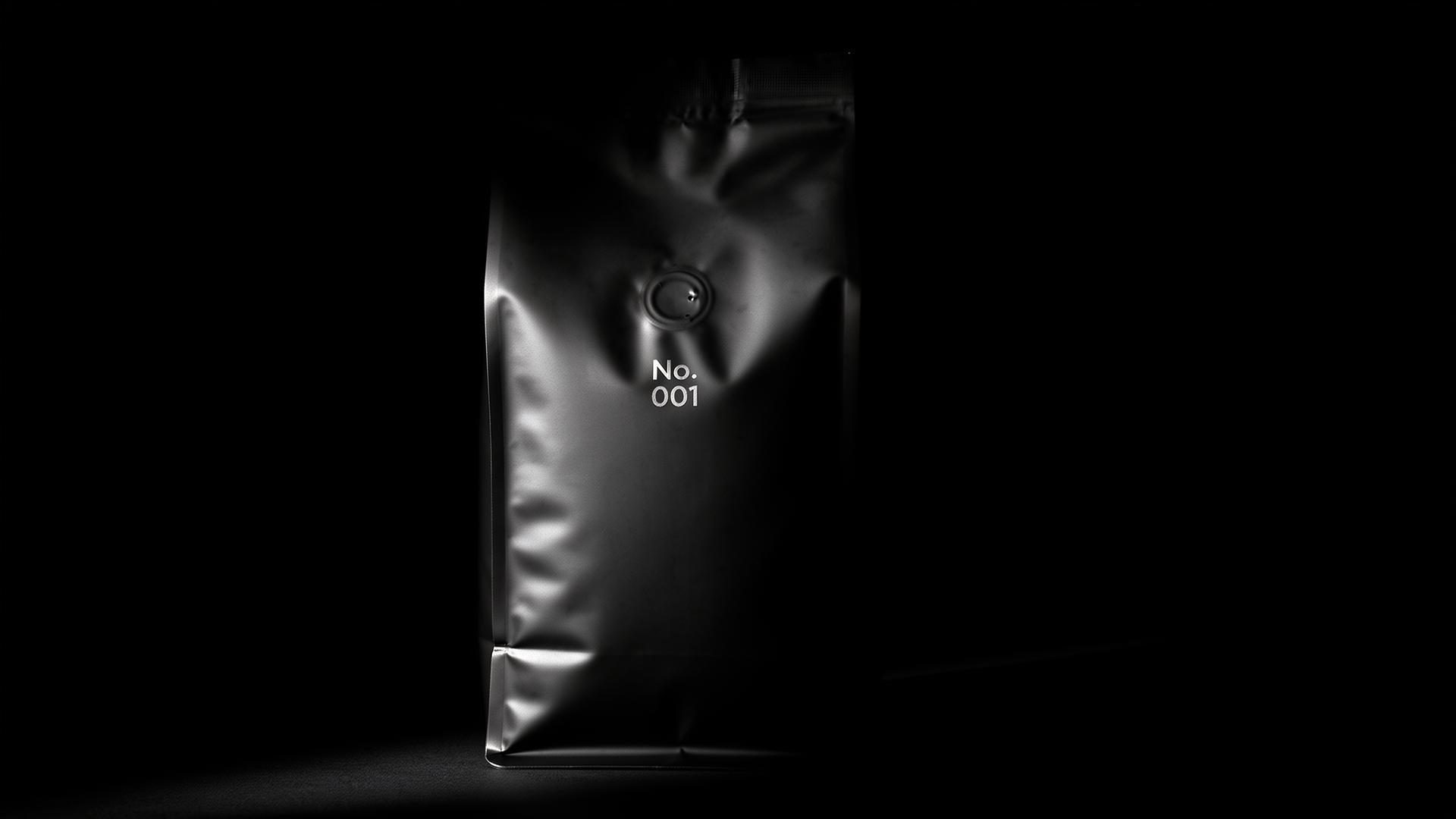 A numbered Black Label bag in deep shadow