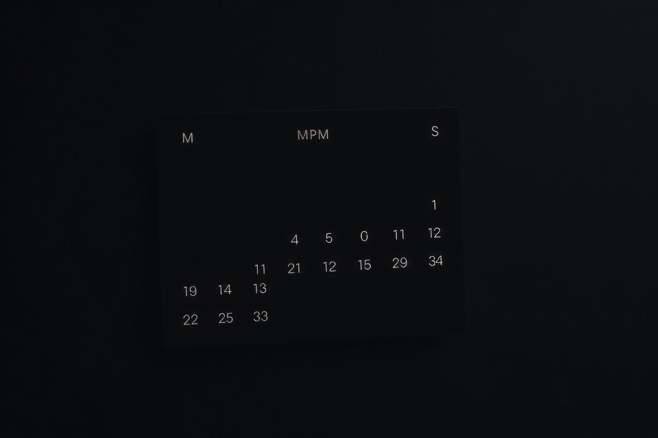 Minimal calendar UI with highlighted release dates